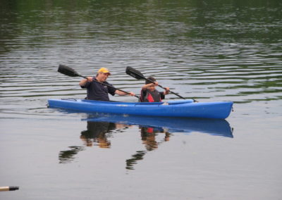 Father and son kayaking on the Restigouche River. Broadlands, Gaspésie, PQ