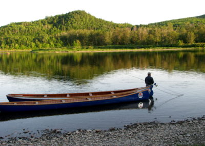 Enjoying fishing on the Restigouche River. Gaspésie, Broadlands, PQ